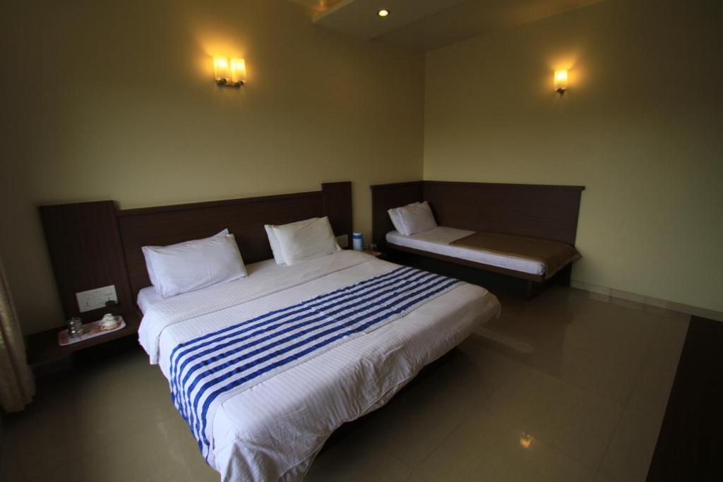 Hotel Sai Smaran 쉬르디 객실 사진
